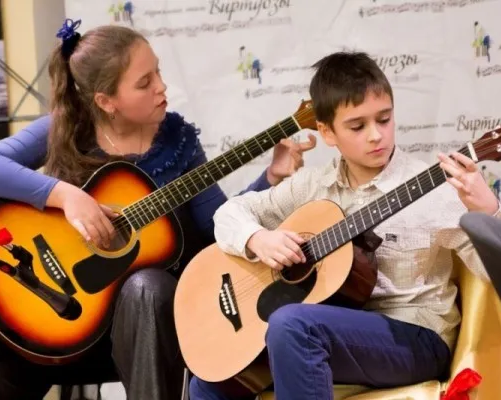 Студия игры на гитаре (на ул. Коммунистической)