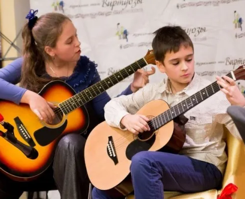 Студия игры на гитаре (на ул. Коммунистической)